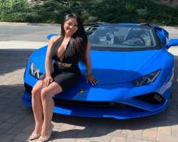 She is obsessed with her blue lamboevo and often posts in front of her.